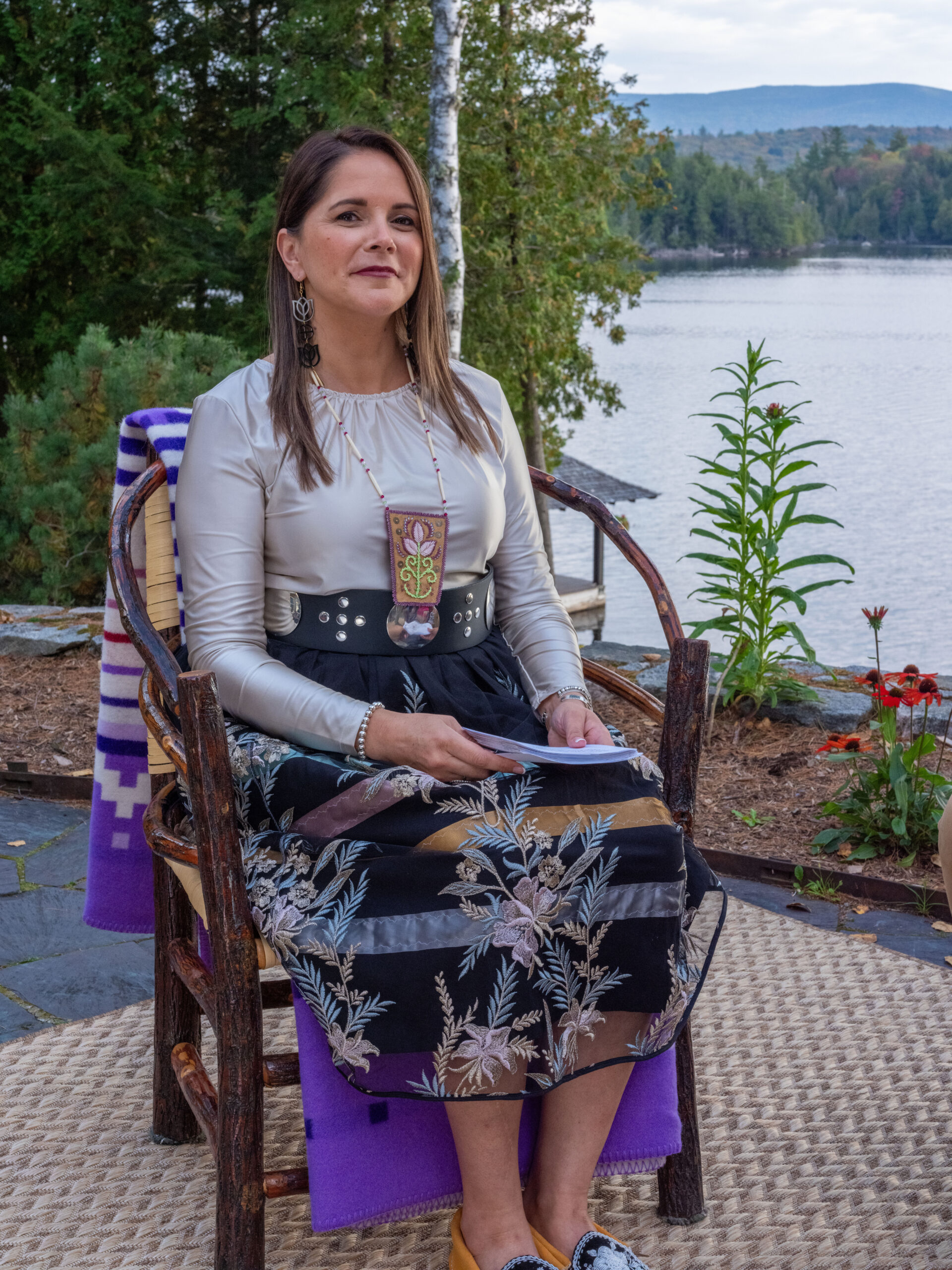 Michelle sitting by the lake